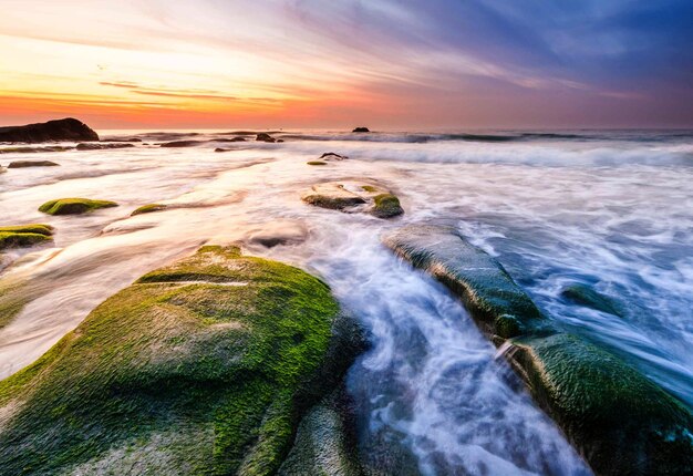 Scenic view of sea against sky during sunset