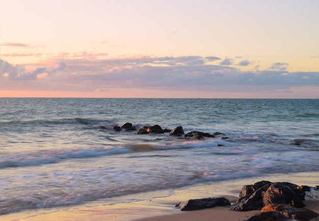 Scenic view of sea against sky during sunset