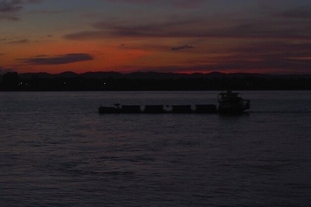 Scenic view of sea against sky at sunset