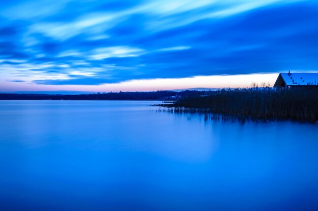 Scenic view of sea against sky at sunset