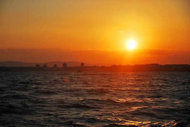 Scenic view of sea against sky during sunset