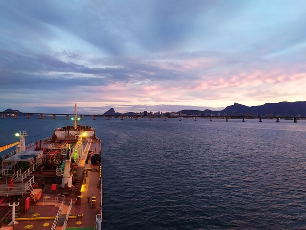 Scenic view of sea against sky at sunset