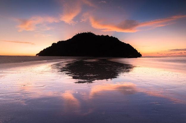 Scenic view of sea against sky at sunset