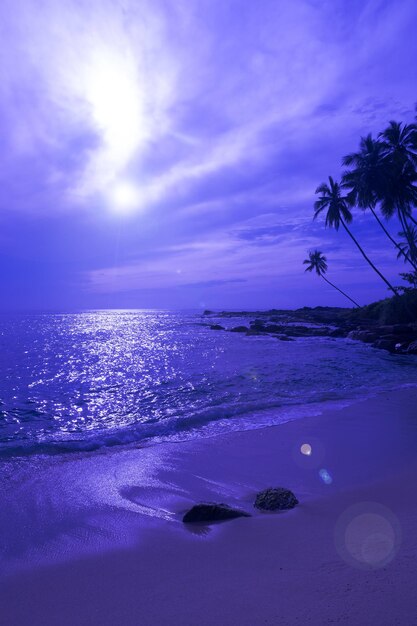 Scenic view of sea against sky at sunset