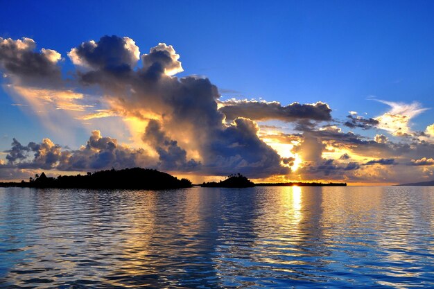 Scenic view of sea against sky at sunset