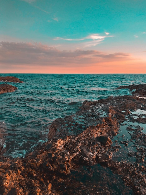 Scenic view of sea against sky during sunset