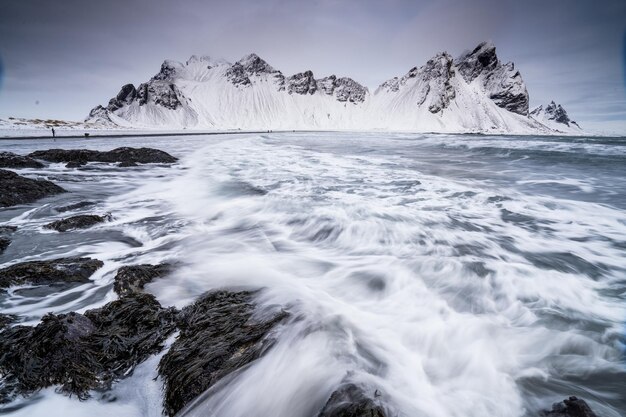 Scenic view of sea against sky during winter