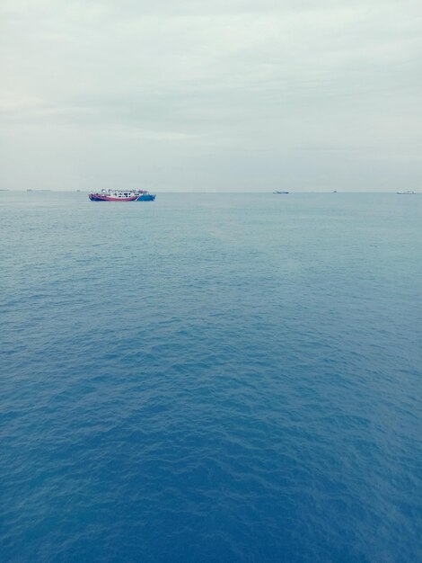 Photo scenic view of sea against sky