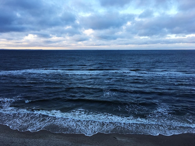 Photo scenic view of sea against sky