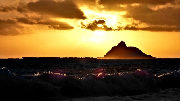 Photo scenic view of sea during sunset