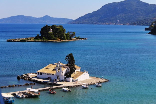 Photo scenic view of sea and islands against sky