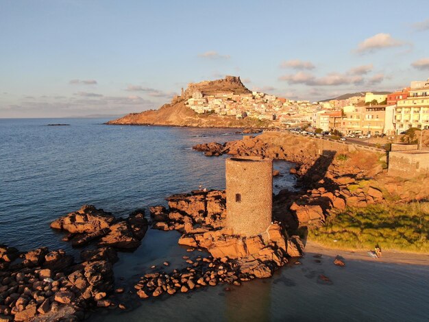 Scenic view of sea and rocks against sky