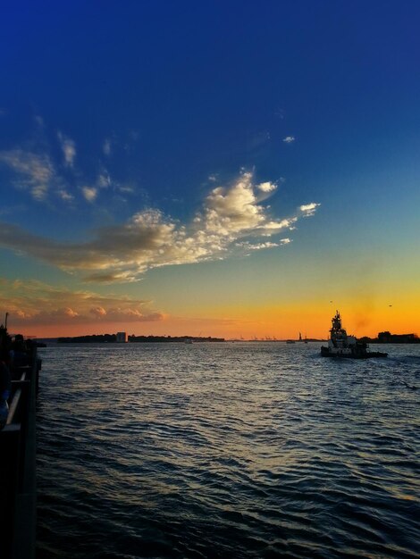 Scenic view of sea at sunset