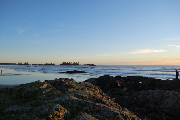 Photo scenic view of sea at sunset