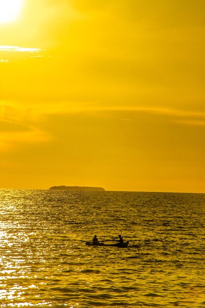 Scenic view of sea at sunset