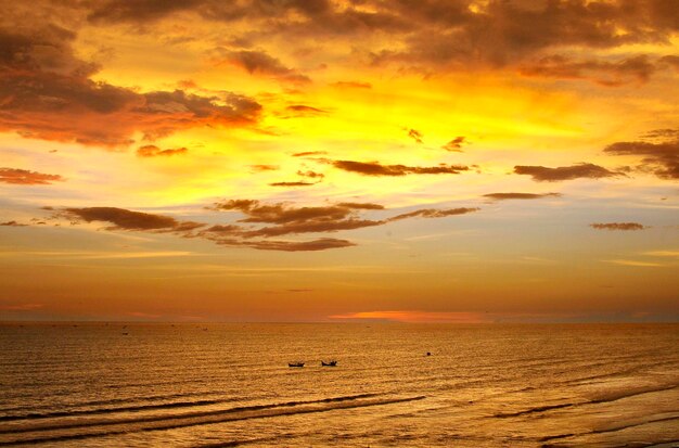 Scenic view of sea at sunset