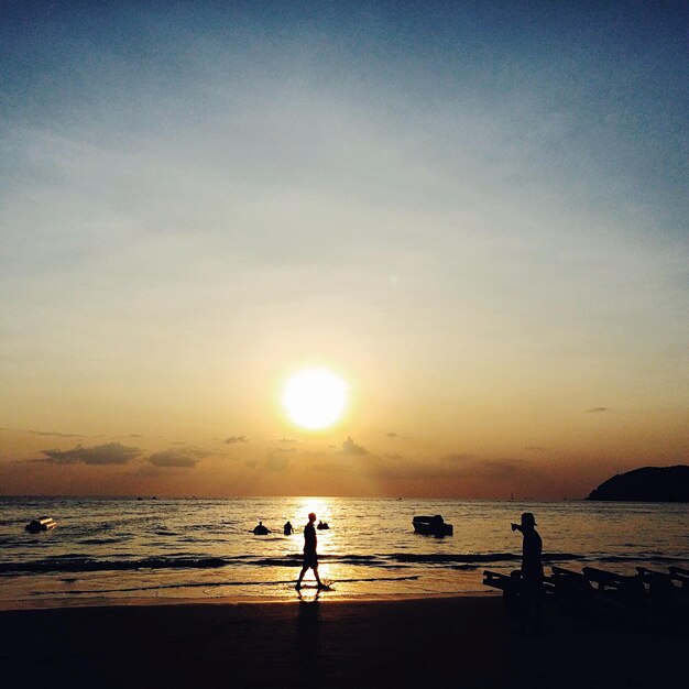 Scenic view of sea at sunset