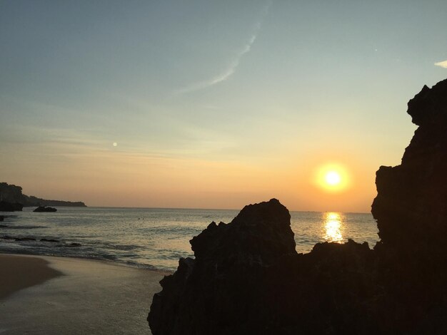 Scenic view of sea at sunset