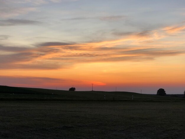 Scenic view of silhouette landscape against sky during sunset