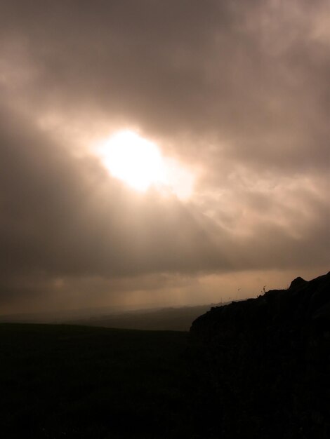 Scenic view of silhouette landscape against sky during sunset