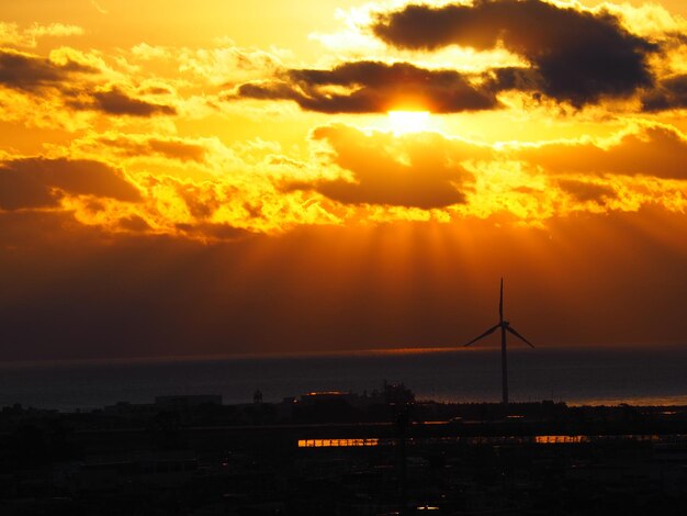 Scenic view of silhouette landscape against sky during sunset