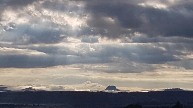 Scenic view of silhouette mountain against sky during sunset