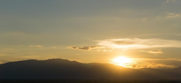 Scenic view of silhouette mountain against sky during sunset