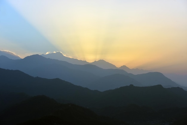 Scenic view of silhouette mountains against sky during sunset