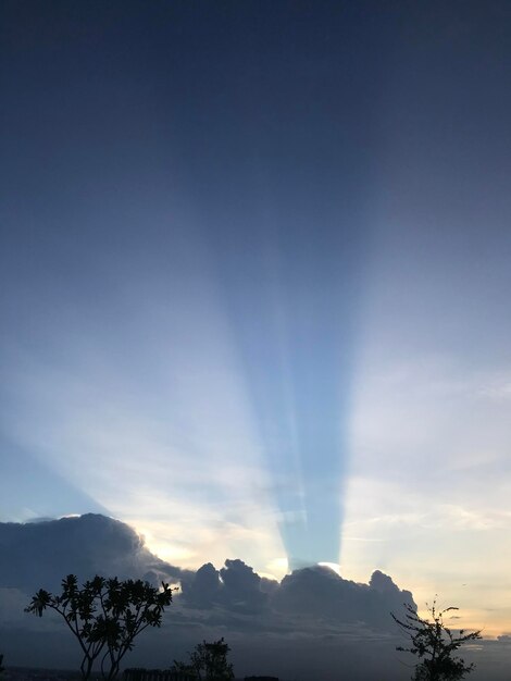 Scenic view of silhouette mountains against sky at sunset