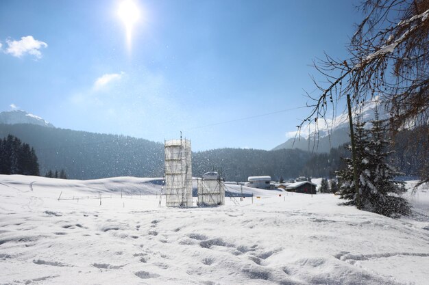 Scenic view of snow covered landscape against sky