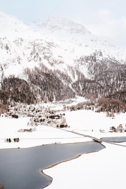 Scenic view of snow covered mountains against sky