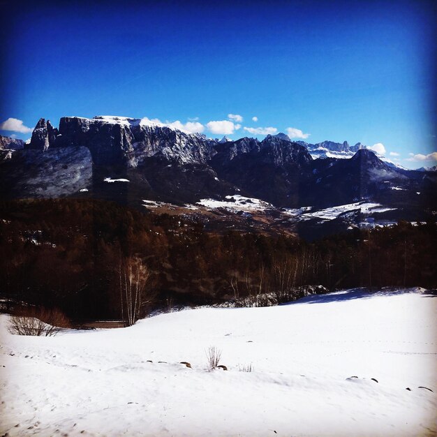 Scenic view of snow covered mountains