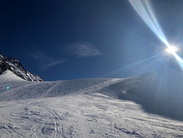 Scenic view of snowcapped mountain against sky