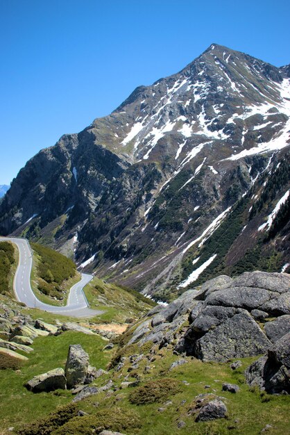 Scenic view of snowcapped mountains against clear sky