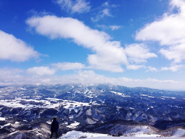 Scenic view of snowcapped mountains against sky