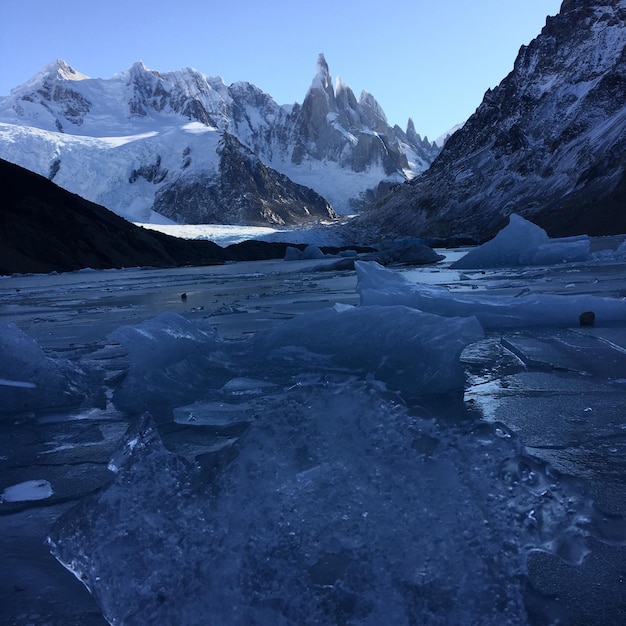 Scenic view of snowcapped mountains and river