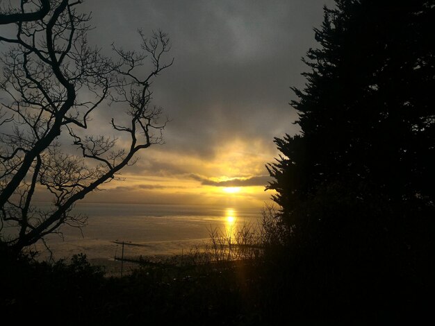 Photo scenic view of sunset over landscape