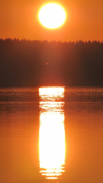 Photo scenic view of sunset over sea