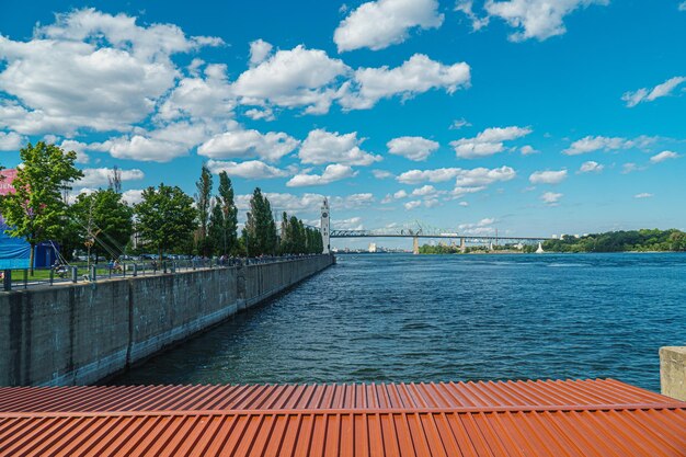 Scenic view of swimming pool by river against sky