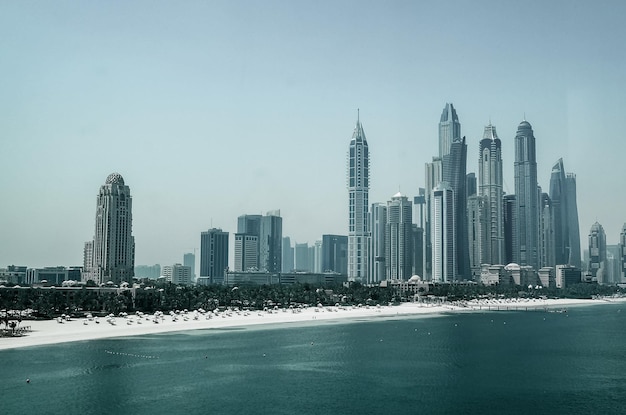 Scenic view of various skyscrapers including Cayan Tower in Dubai Marina