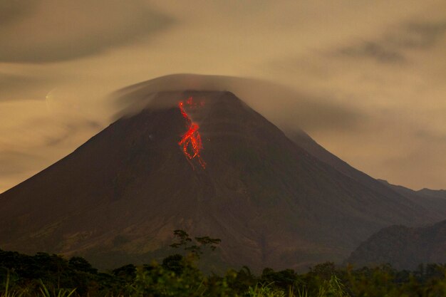 Scenic view of volcanic mountain against sky