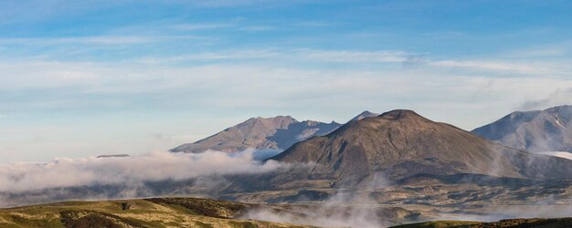 Scenic view of volcanic mountain against sky