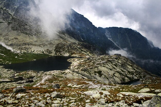 Scenic view of waterfall against sky