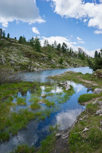 Scenic view of waterfall against sky