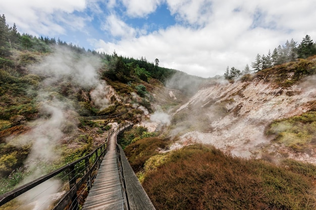 Scenic view of waterfall against sky