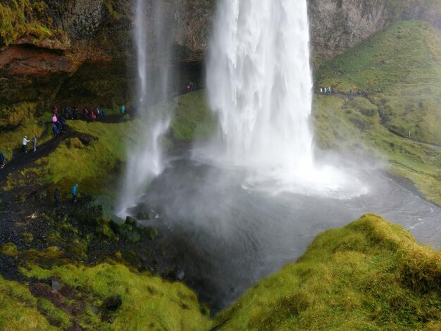 Photo scenic view of waterfall