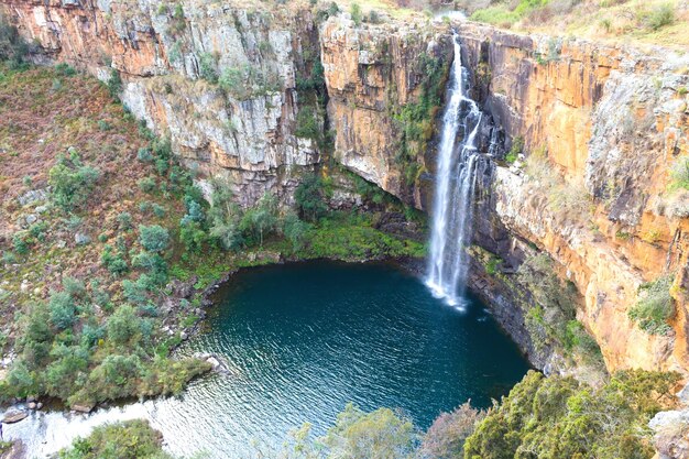 Photo scenic view of waterfall