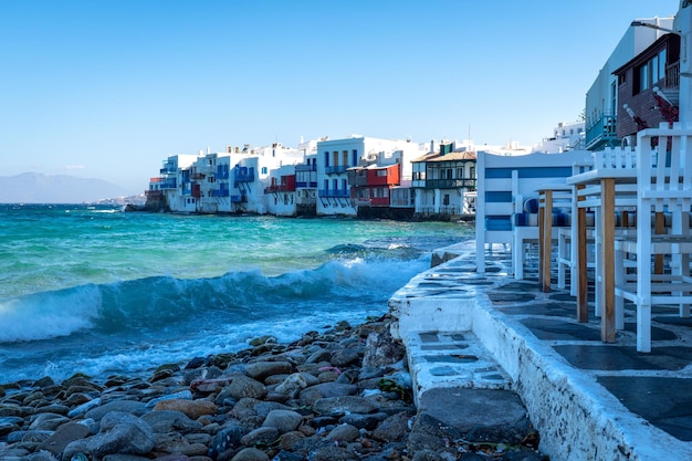 Scenic vista of Little Venice in Mykonos Greece at sunset with multicolored buildings