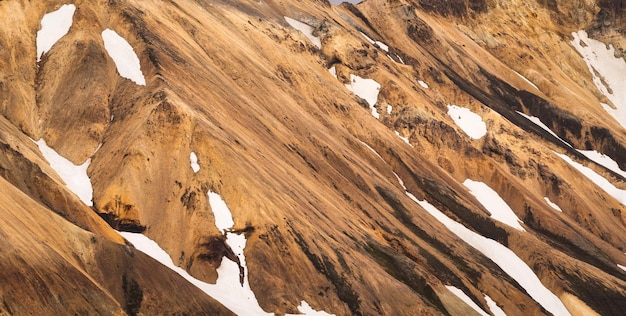 Scenic of volcanic mountain with snow covered in Fjallabak nature reserve on Icelandic highlands at Landmannalaugar Iceland