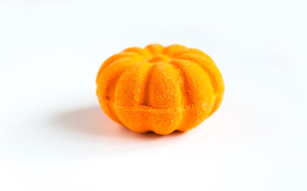 Scented orange bath bomb in the shape of a pumpkin Skin care product